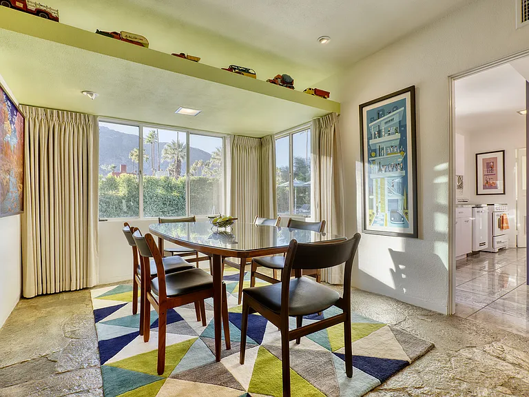 Formal dining area with view to kitchen.