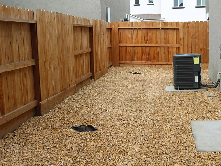 low maintenance back yard. 3 trees are planned to be planted.