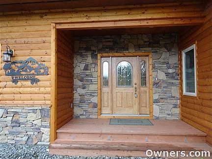 Welcoming Ledgestone Entrance