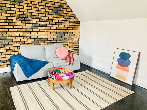 Large Room 1. Can be set up as either a living room or a large bedroom with queen/fuill bed, desk/chair and a couch