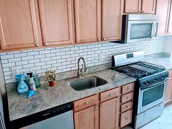Stainless steel appliances and granite countertops.
