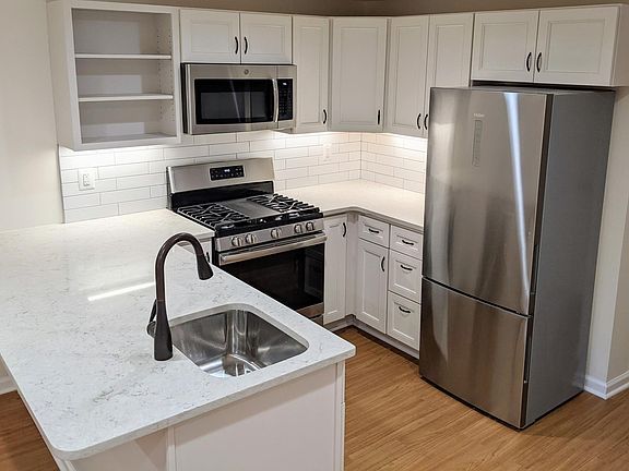 New stainless steel appliances and lots of cupboard space