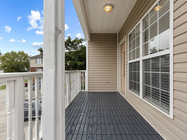 Front deck leading to front door.
