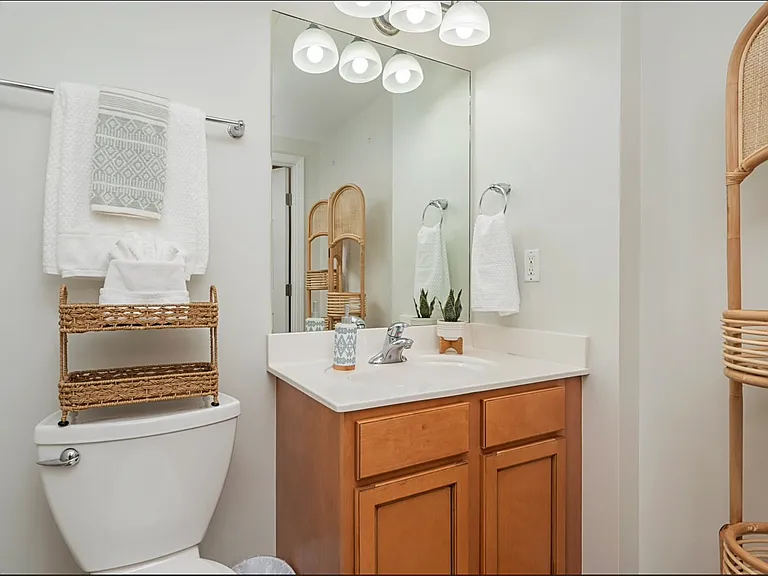 You large FULL Secondary Bathroom is located right off the second bedroom with bunk beds and features a WALK-IN SHOWER.