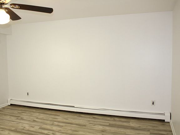 Bedroom 1 w/ new modern flooring