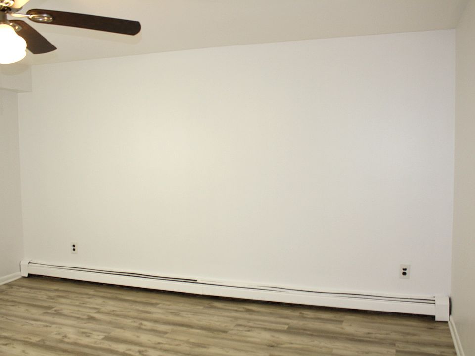 Bedroom 1 w/ new modern flooring