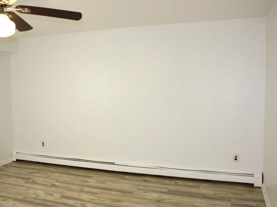Bedroom 1 w/ new modern flooring