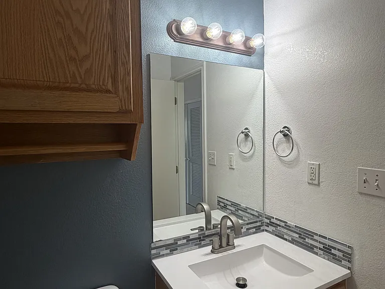 Hallway and guest bathroom.