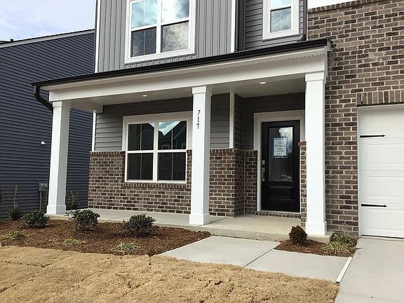 Exterior - Classic siding and a breezy coastal palette.