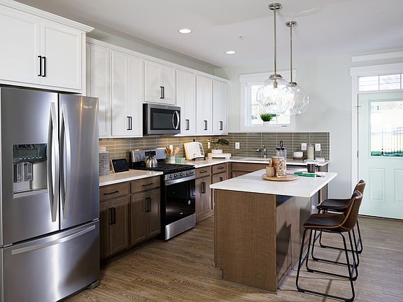 The kitchen in the Glendale townhome at Lakeside at Trappe.