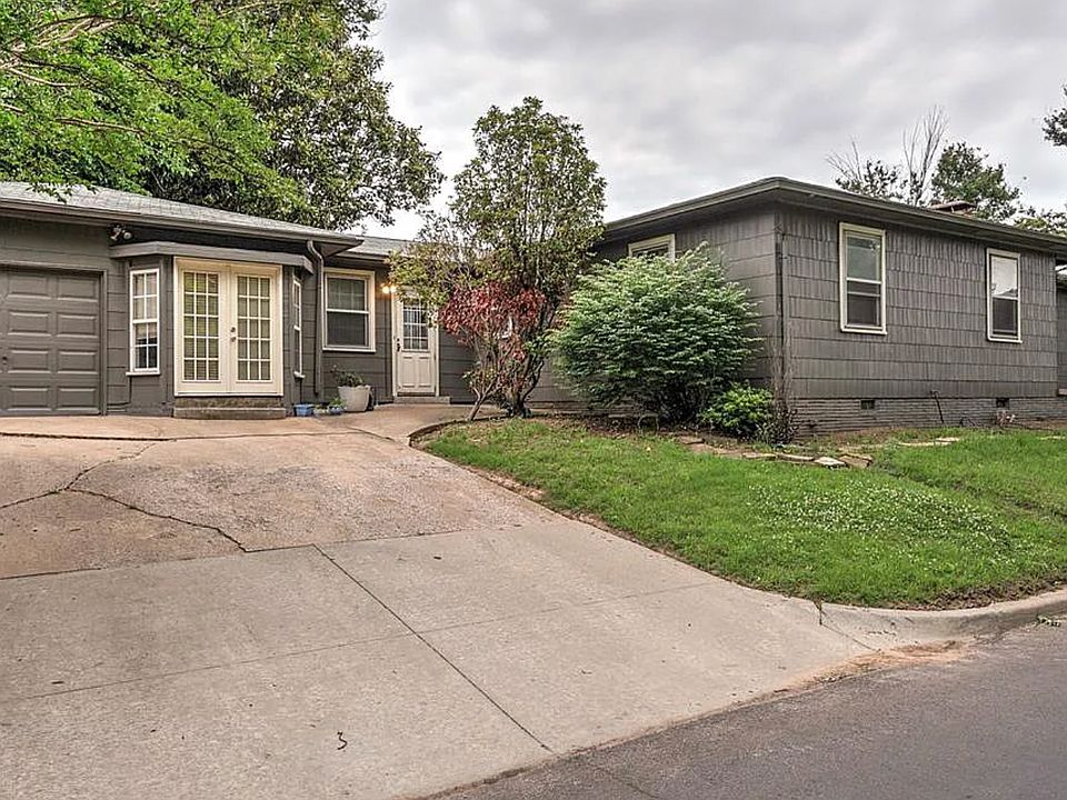 An entrance into the home from Driveway on W. 15th Street