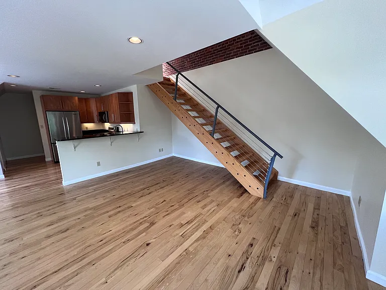 Stairs leading to second floor bedroom