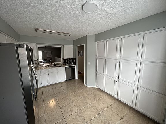 Kitchen - full wall of cabinets. All appliances less than 3 years old