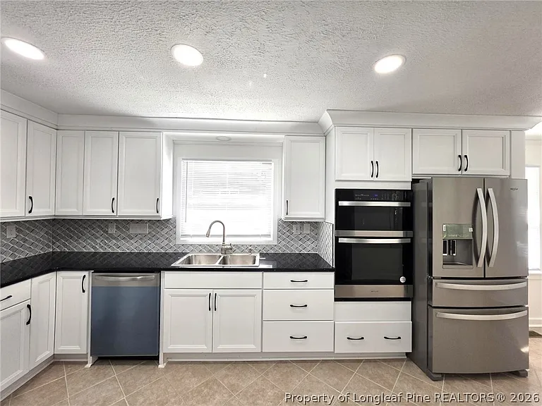 216 Country Club Dr — Photo 12