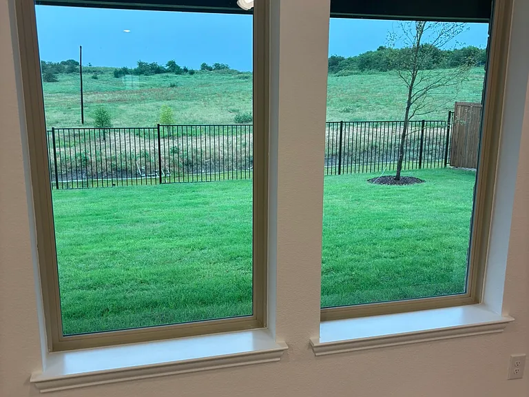 View from family room into backyard- excellent privacy due to greenbelt area