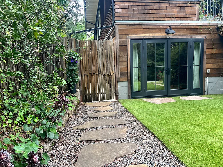There is now a gate leading to the side yard.