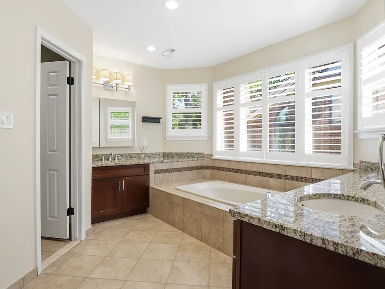 Primary Bathroom with Soaking Tub and Private Standing Shower