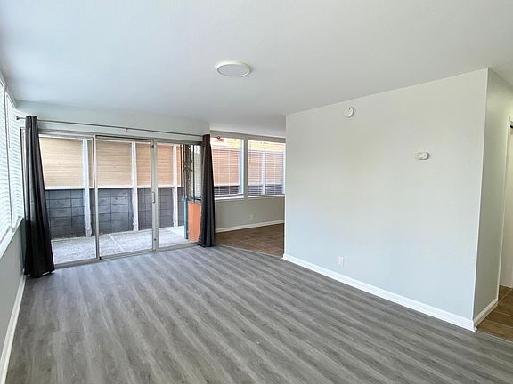 Large Living Room Opens to Dining Area