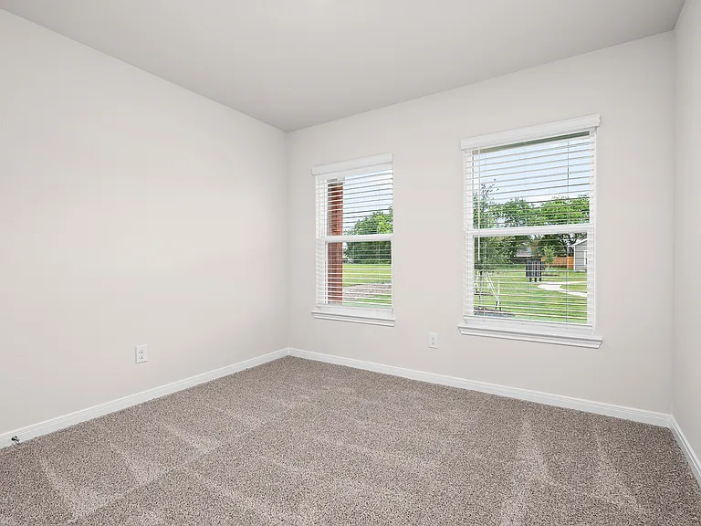 The secondary bedrooms are a great space for a children's bedroom, guest room, or home office.