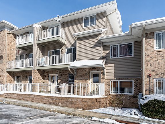 3 Floor Unit with A Garage & Parking Space