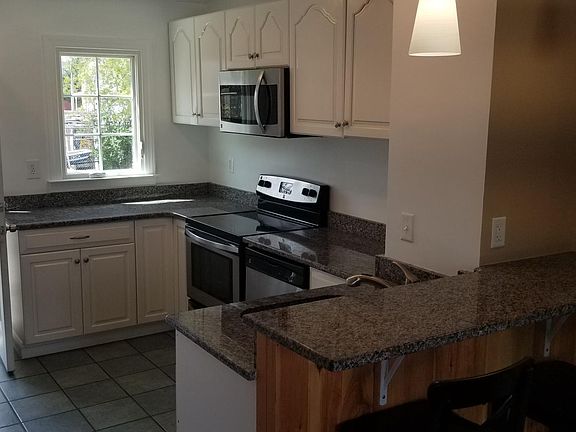 Kitchen with bar height counter