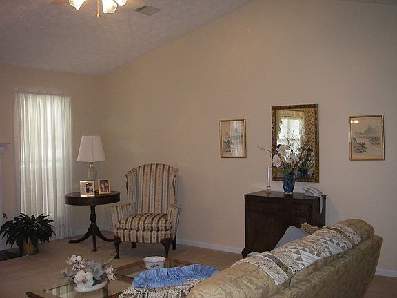 Large family room with vaulted ceiling.