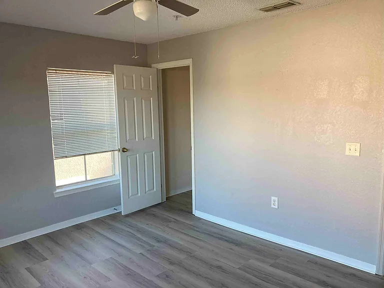 The 2nd bedroom with new installed Vinyl plank floor
