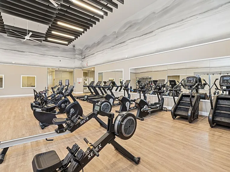 State-of-the-art fitness center with cardio equipment