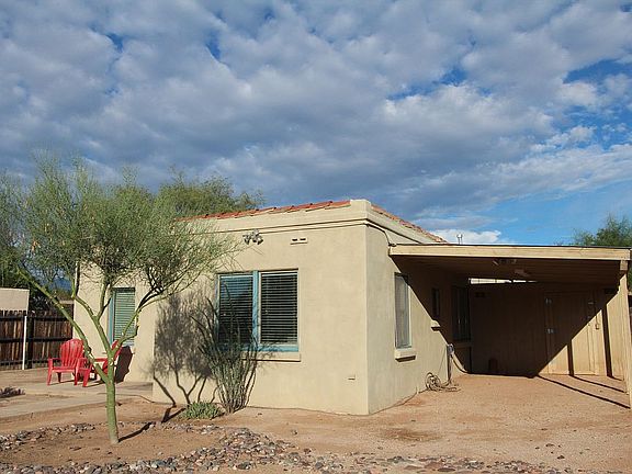 Carport with Storage Shed