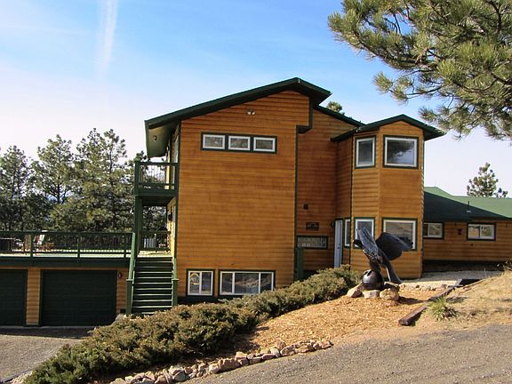 front of lodge-style modern home
