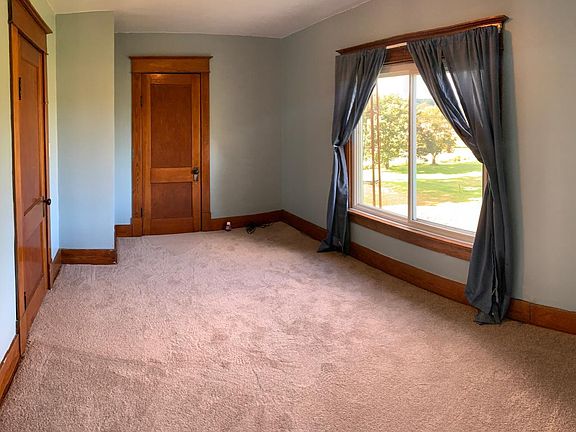 Large upstairs bedroom with walk in closet, large window, and amazing view!
