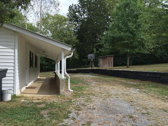 storage bldg, circle driveway