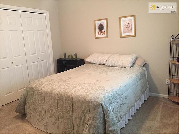 Sizable guest bedroom with large closet.