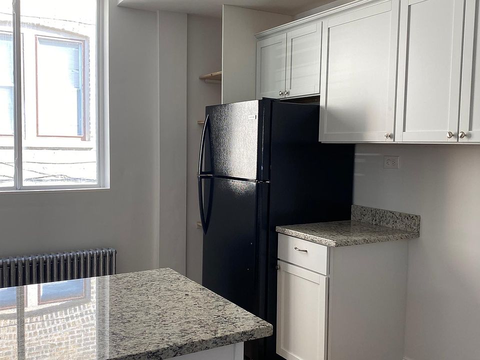 Completely rehabbed kitchen with new appliances, cabinets and granite counter tops.