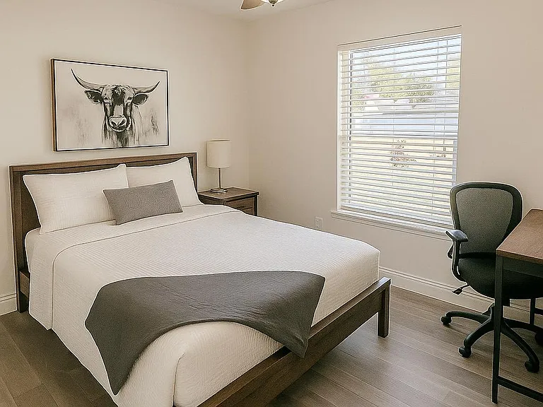 A1 Blue: Large, sunlit room with full memory foam bed, desk, smart lock, and ceiling fan work and rest in comfort.
