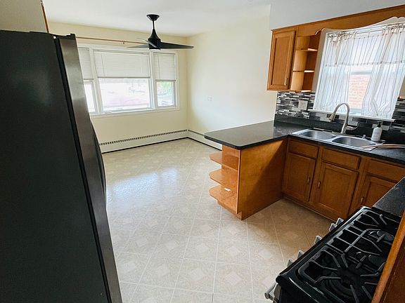 Huge kitchen with vintage charm & modern stainless steel appliances!