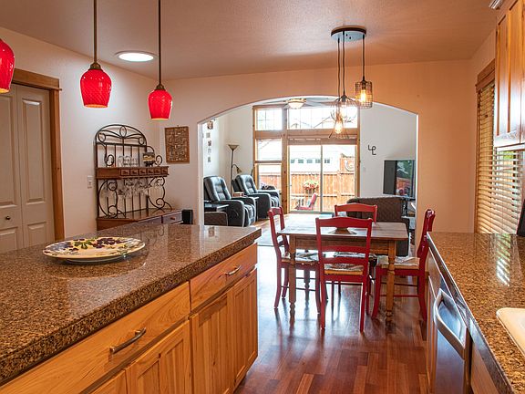 View of dining area into living room, open floor plan