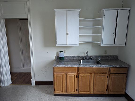 Eat-in kitchen is in the rear of the house.