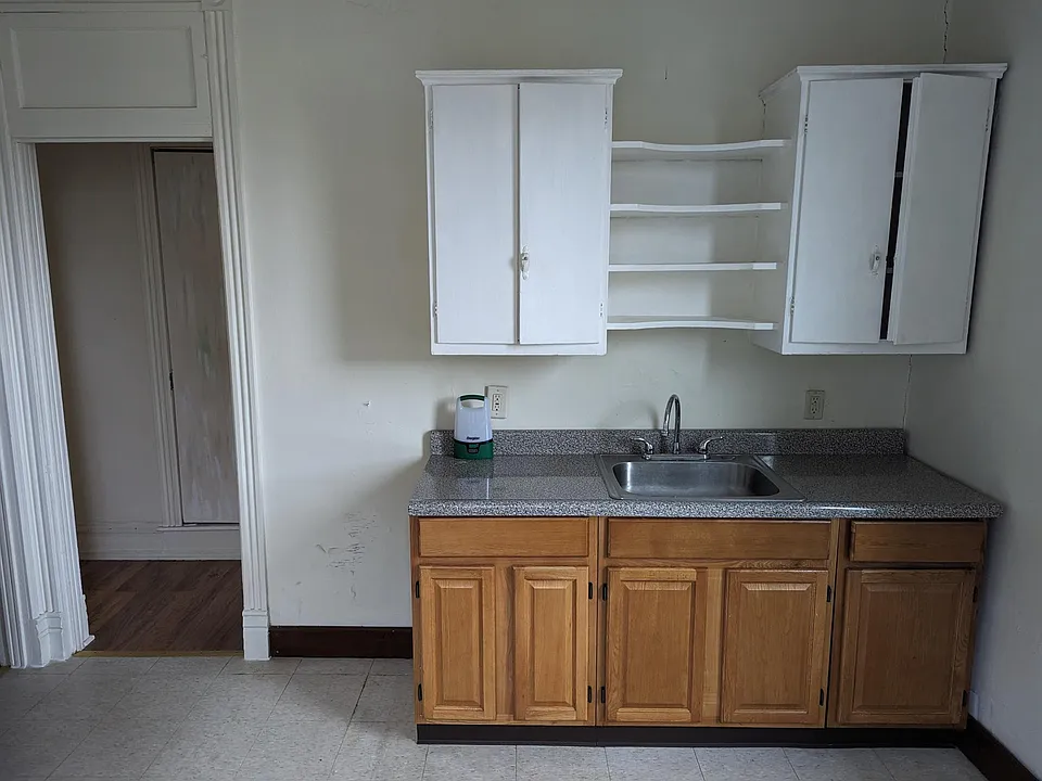 Eat-in kitchen is in the rear of the house.