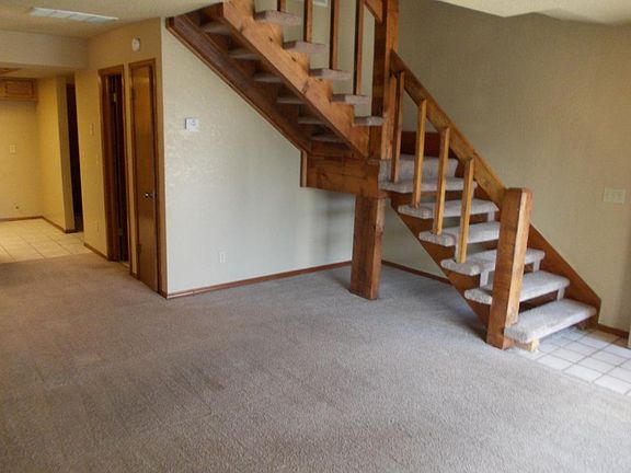 LIVING ROOM HAS NEW LAMINANTE FLOORS/Stairs HAVE NEW CARPETING AND UPSTAIRS HAVE NEW CARPETING