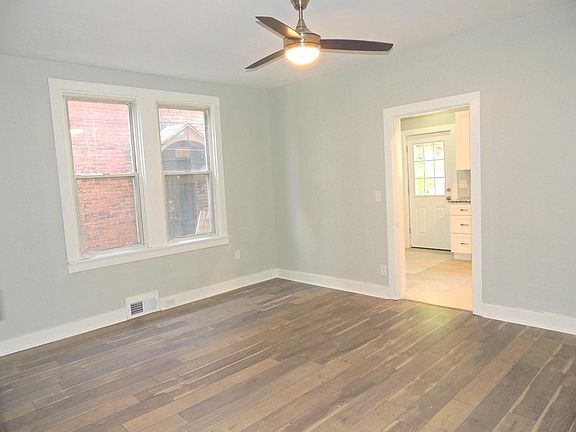 Dining room looking into brand-new kitchen