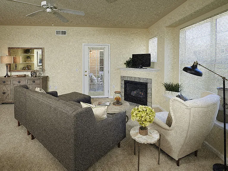 Ceiling fans and gas fireplaces in living room
