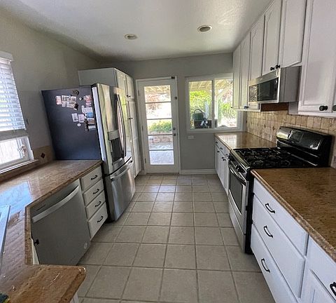 Kitchen facing toward back of house/ back yard.