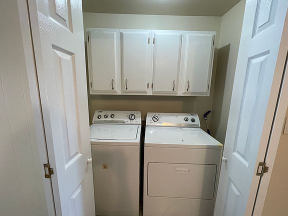 Washer/dryer off kitchen
