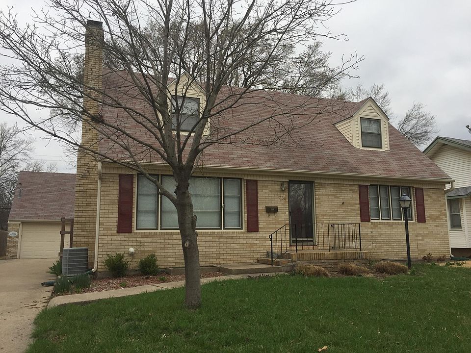 1.5 story Cape Cod style four bedroom home with basement.