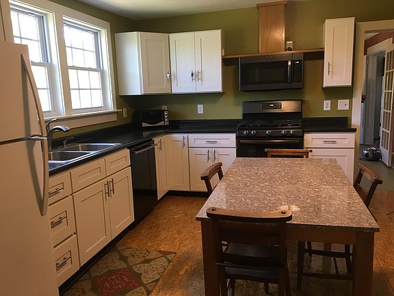 Newly renovated kitchen with gas range.