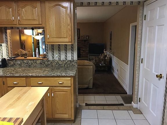 Kitchen looking into TV Rm