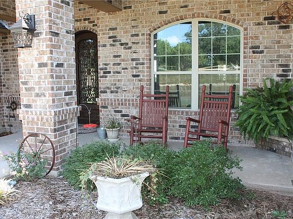 Front Exterior Entry with Distinctive Iron Door