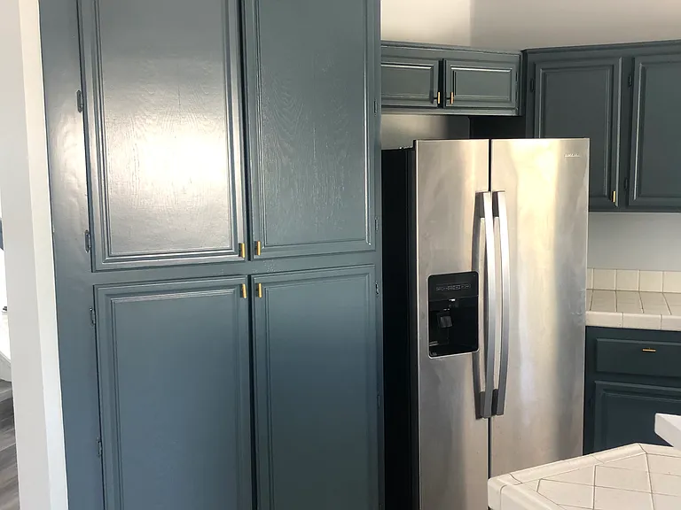 kitchen cabinets, refrigerator