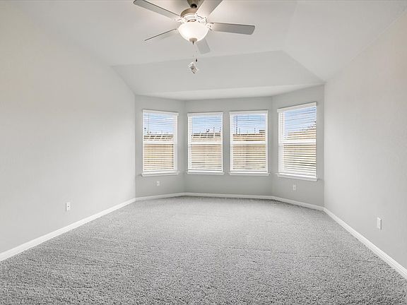 Get plenty of natural lighting in the primary bedroom.
